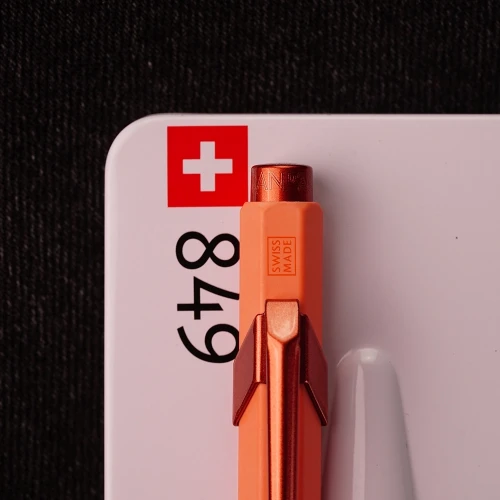 Ручка Caran d'Ache 849 CLAIM YOUR STYLE Tangerine+ box купити за ціною 2575 грн на сайті - THEWATCH