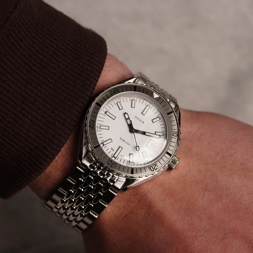 Чоловічий годинник DOXA SUB 200 WHITEPEARL STAINLESS STEEL BEZEL 796.10.011.10 купити за ціною 60000 грн на сайті - THEWATCH